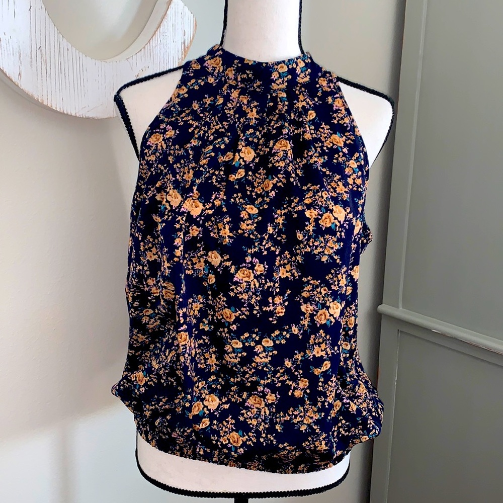 Navy floral sleeveless blouse size L 8-10